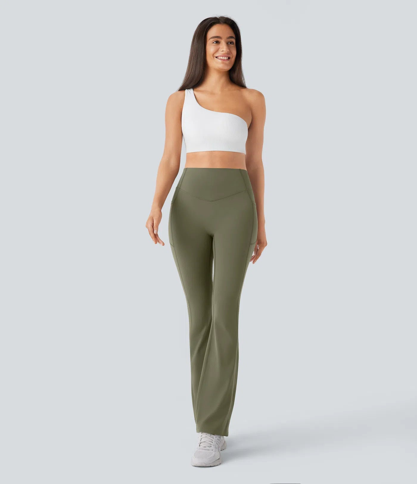 Woman wearing FEMORA scrunch butt bootcut yoga leggings