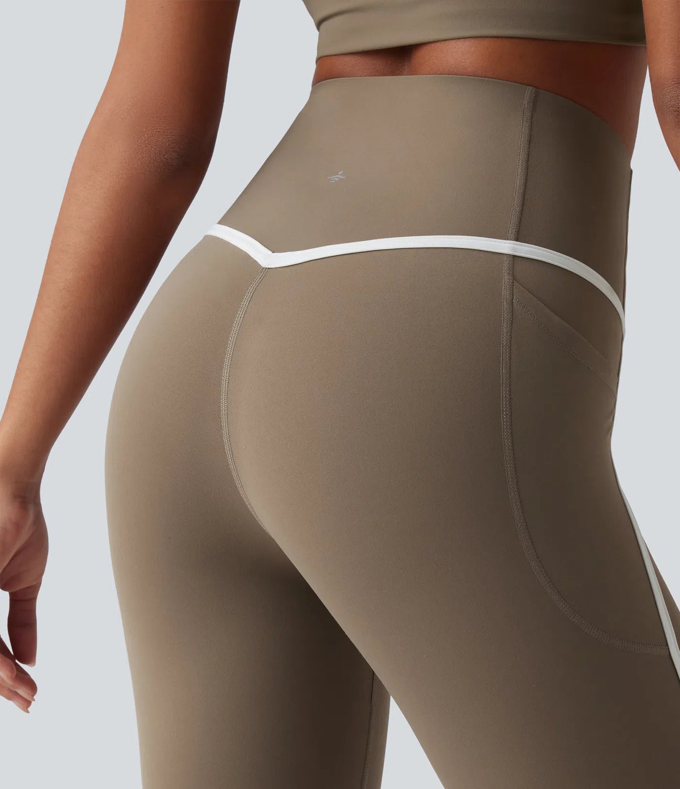 Close-up of FEMORA color block design and waistband detail
