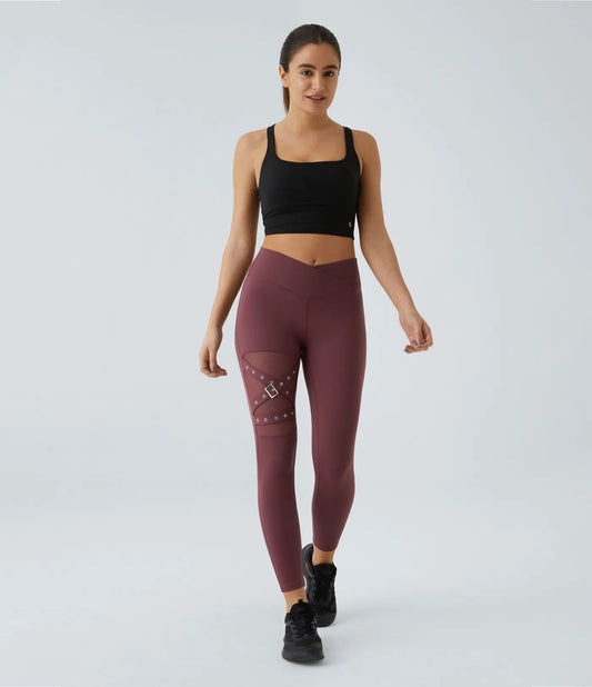 Woman wearing FEMORA crossover mesh yoga leggings
