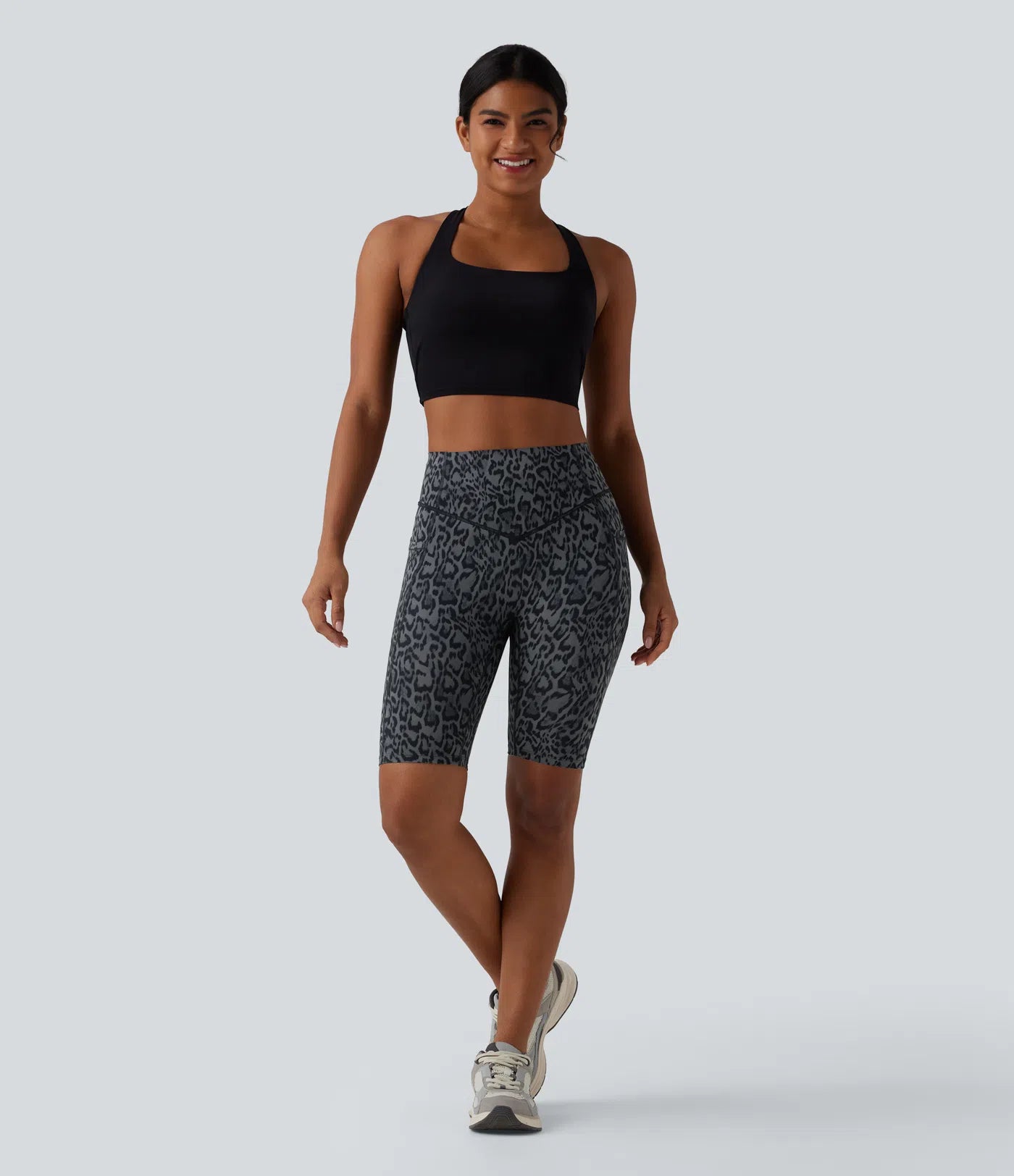 Woman wearing FEMORA leopard print tummy control biker shorts
