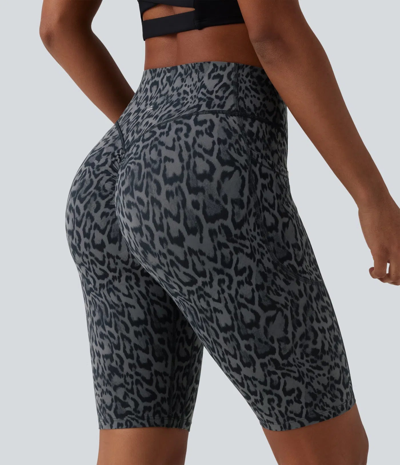 Back view of FEMORA leopard print scrunch butt biker shorts
