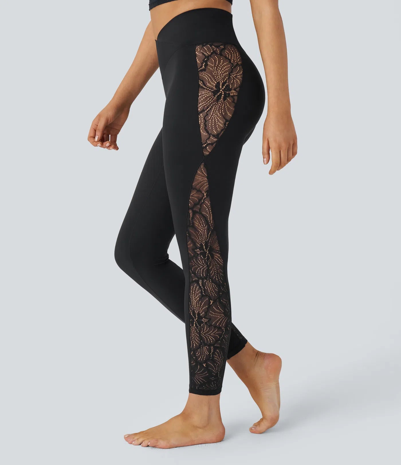 Side view of FEMORA high waisted crossover leggings
