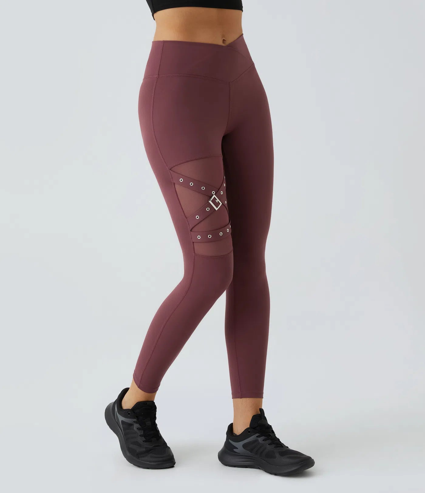 Side view of FEMORA crossover leggings with contrast mesh
