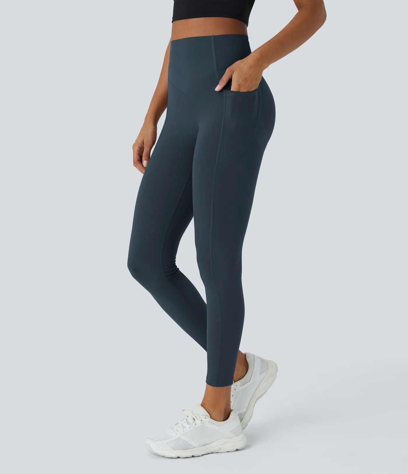Side view of FEMORA high waisted scrunch butt leggings
