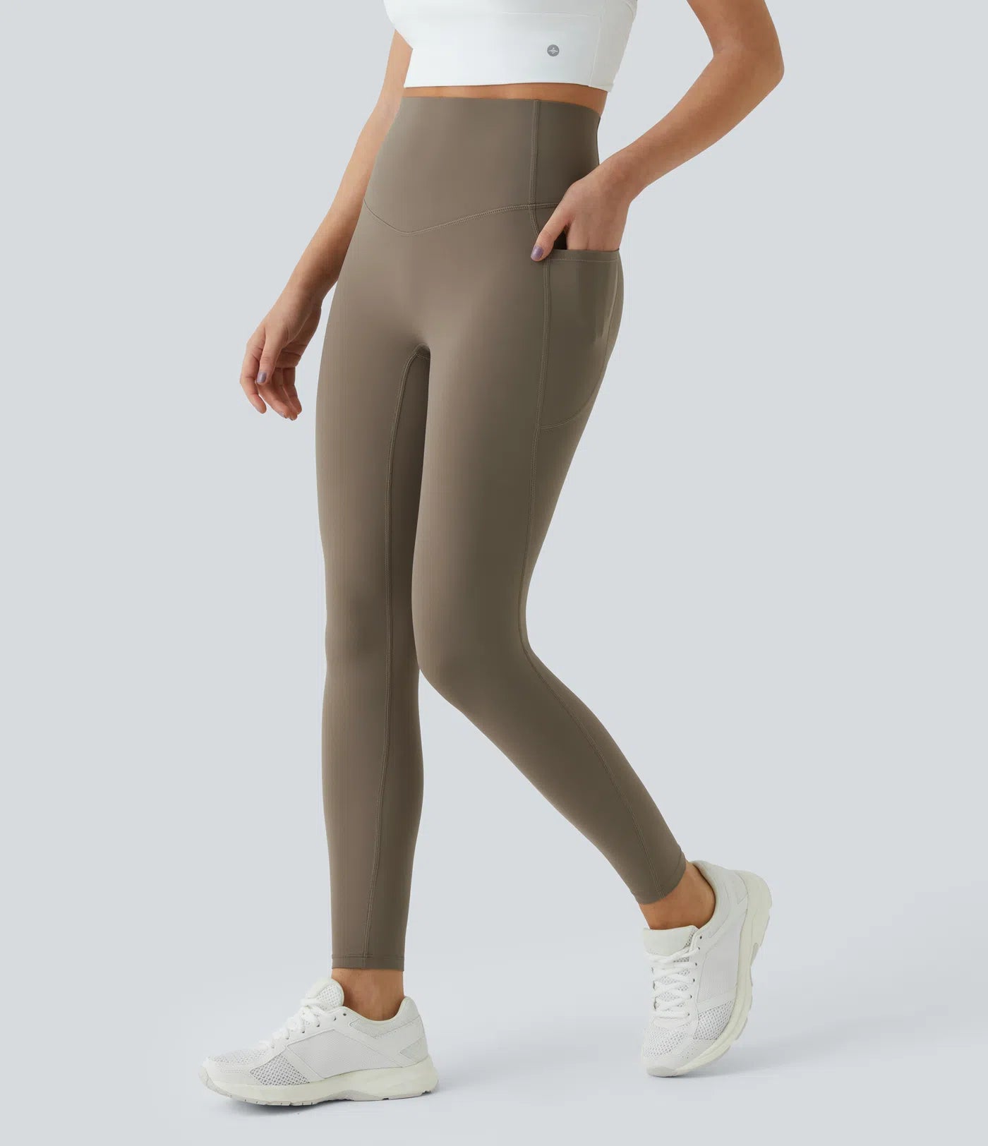 Side view of FEMORA high waisted yoga leggings with pockets

