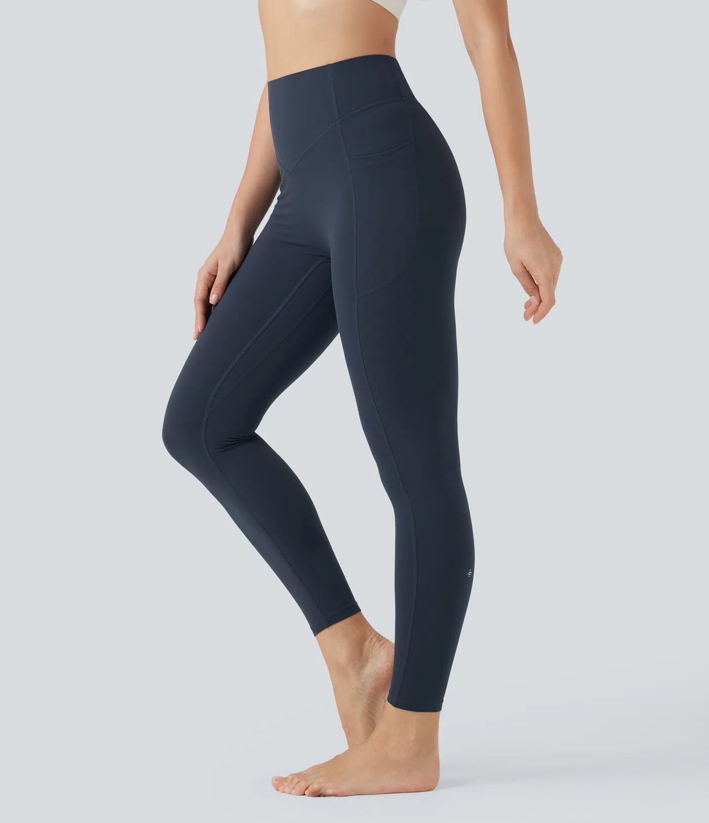 Side view of FEMORA tummy control leggings with pockets

