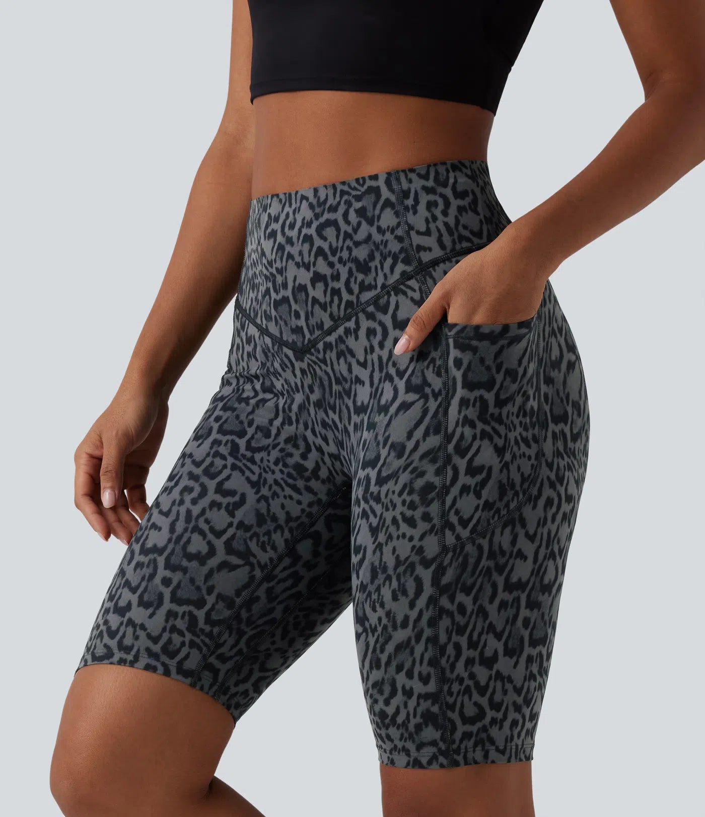 Side view of FEMORA 9 inch high waisted leopard biker shorts
