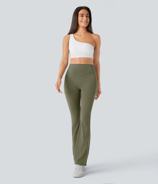 Woman wearing FEMORA scrunch butt bootcut yoga leggings
